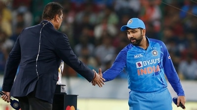 Indian skipper Rohit Sharma shakes hand with Ravi Shastri at the toss (ANI)