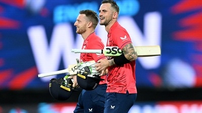 Jos Buttler and Alex Hales walk back (via REUTERS)