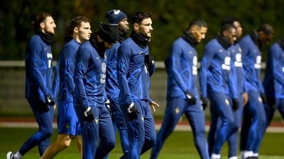 France's national football team forward Karim Benzema (front L) and goalkeeper Hugo Lloris (front R) attend a training session at the team's training camp in Clairefontaine-en-Yvelines, south of Paris, on November 14, 2022, six days ahead of the Qatar 2022 FIFA World Cup football tournament. (Photo by FRANCK FIFE / AFP) (Getty Images) France's national football team forward Karim Benzema (front L) and goalkeeper Hugo Lloris (front R) attend a training session at the team's training camp in Clairefontaine-en-Yvelines, south of Paris, on November 14, 2022, six days ahead of the Qatar 2022 FIFA World Cup football tournament. (Photo by FRANCK FIFE / AFP) (Getty Images)