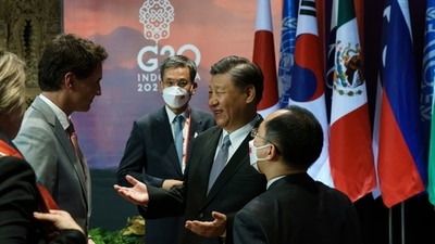 Canada's Prime Minister Justin Trudeau speaks with China's President Xi Jinping at the G20 Leaders' Summit in Bali, Indonesia. (Reuters)