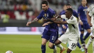 Argentina's Lionel Messi, left, and Khalifa Alhammadi of the United Arab Emirates fight for the ball (AP) Argentina's Lionel Messi, left, and Khalifa Alhammadi of the United Arab Emirates fight for the ball (AP)