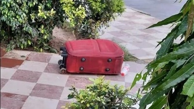 The red suitcase in which the man’s body was found outside Jalandhar City railway station on Tuesday. (HT Photo) The red suitcase in which the man’s body was found outside Jalandhar City railway station on Tuesday. (HT Photo)