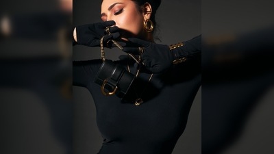 Esha Gupta topped up her black dress with gold jewellery, perfectly blending with the theme of her look. (Instagram/@egupta) Esha Gupta topped up her black dress with gold jewellery, perfectly blending with the theme of her look. (Instagram/@egupta)