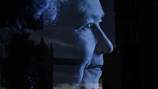 Queen Elizabeth II: Tower Bridge is reflected on a picture of Britain's Queen Elizabeth II in London.(AFP)