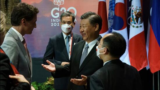 Canada's Prime Minister Justin Trudeau speaks with China’s President Xi Jinping at the G20 Leaders' Summit in Bali, Indonesia, on Wednesday. (REUTERS)