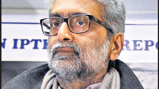 FILE - In this Dec. 6, 2012 file photo, Indian human rights activist Gautam Navlakha displays a report by two rights groups during a press conference in Srinagar, India. Indian police have arrested Navlakha and four other rights activists for suspected links to Maoists in raids on their homes and offices at several places in the country Tuesday, Aug. 28, 2018. The government crackdown was condemned by Aakar Patel, executive director of Amnesty International India, who said the arrests threatened core human rights values. (AP Photo/Mukhtar Khan, File) (AP) FILE - In this Dec. 6, 2012 file photo, Indian human rights activist Gautam Navlakha displays a report by two rights groups during a press conference in Srinagar, India. Indian police have arrested Navlakha and four other rights activists for suspected links to Maoists in raids on their homes and offices at several places in the country Tuesday, Aug. 28, 2018. The government crackdown was condemned by Aakar Patel, executive director of Amnesty International India, who said the arrests threatened core human rights values. (AP Photo/Mukhtar Khan, File) (AP)