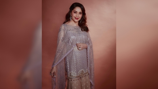 "She walked in moon dust, and stars were sprinkled in her hair," Madhuri Dixit captioned her post.(Instagram/@madhuridixitnene)