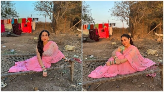 Sara Ali Khan is currently travelling to the corners of the country. The actor recently visited a rural part of the country and did a fashion photoshoot. The actor picked the stunning six yards of grace and embraced the culture, beauty and the traditions of the country as she posed with the dwellers of the area. “Wherever you go becomes a part of you somehow,” she captioned her pictures. Check out her attire here.(Instagram/@saraalikhan95)