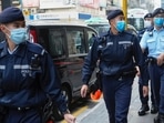 Hong Kong: Police officers guard outside the building of Stand News' office in Hong Kong. (AP) Hong Kong: Police officers guard outside the building of Stand News' office in Hong Kong. (AP)
