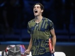 Taylor Fritz celebrates after winning against Felix Auger-Aliassime during their singles tennis match of the ATP World Tour Finals, at the Pala Alpitour in Turin(AP) Taylor Fritz celebrates after winning against Felix Auger-Aliassime during their singles tennis match of the ATP World Tour Finals, at the Pala Alpitour in Turin(AP)