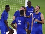  France's Randal Kolo Muani and Adrien Rabiot with teammates during training 