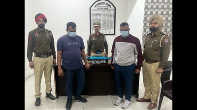 The accused fraudsters in custody of Ludhiana police. (HT Photo)