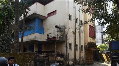 The compound of the building has two iron gates. One of them leads to the 41-square-foot hall on the first floor. It has been locked by the NIA to prevent access to the room, said sources. CCTV cameras have also been installed in the building. (HT PHOTO)