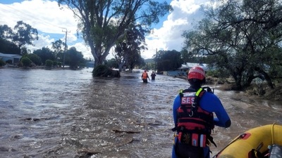 Australia Floods: Officials in rescue work in the flooded towns in Australia. (AFP) Australia Floods: Officials in rescue work in the flooded towns in Australia. (AFP)