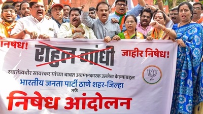 BJP workers raise slogans during a protest against Congress leader Rahul Gandhi over his controversial remarks about VD Savarkar, Friday. (PTI) BJP workers raise slogans during a protest against Congress leader Rahul Gandhi over his controversial remarks about VD Savarkar, Friday. (PTI)