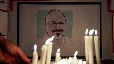 The Committee to Protect Journalists and other press freedom activists hold a candlelight vigil in front of the Saudi Embassy to remember journalist Jamal Khashogg. (Reuters File)