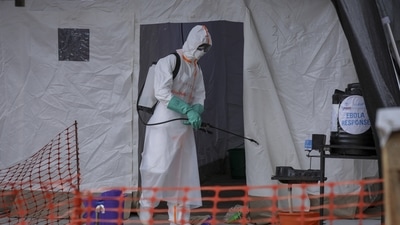 A medical worker disinfects a tent used for suspected Ebola victims inside the Ebola isolation center of Madudu Health Center III, in the village of Madudu, in the Mubende district of Uganda November 1. (AP) A medical worker disinfects a tent used for suspected Ebola victims inside the Ebola isolation center of Madudu Health Center III, in the village of Madudu, in the Mubende district of Uganda November 1. (AP)
