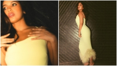 Bhumi's dress features a one-shoulder neckline, a corseted midriff, cinched waist, a figure-hugging silhouette accentuating her curves, a midi-length skirt, and an asymmetrical hemline adorned with faux fur embellishments. (Instagram) Bhumi's dress features a one-shoulder neckline, a corseted midriff, cinched waist, a figure-hugging silhouette accentuating her curves, a midi-length skirt, and an asymmetrical hemline adorned with faux fur embellishments. (Instagram)