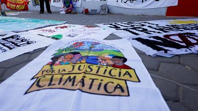 FILE PHOTO: Climate activists stand next to banners as they take part in a protest during the COP27 climate summit, in Sharm el-Sheikh, Egypt, November 18, 2022. REUTERS/Mohammed Salem/File Photo (REUTERS) FILE PHOTO: Climate activists stand next to banners as they take part in a protest during the COP27 climate summit, in Sharm el-Sheikh, Egypt, November 18, 2022. REUTERS/Mohammed Salem/File Photo (REUTERS)