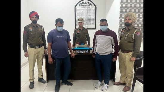 The accused fraudsters in custody of Ludhiana police. (HT Photo)
