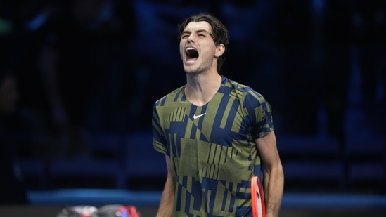 Taylor Fritz celebrates after winning against Felix Auger-Aliassime during their singles tennis match of the ATP World Tour Finals, at the Pala Alpitour in Turin(AP)