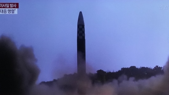 A TV screen shows a file image of North Korea's missile launch. (AP)