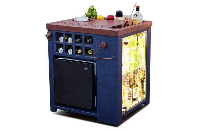This must have, very smart, leather wrap, cabinet style, portable bar comes with an inbuilt mini refrigerator, backlit display unit, cocktail station, drip trays and other functional trimmings. (Model X sapphire blue home bar by SpeedX) This must have, very smart, leather wrap, cabinet style, portable bar comes with an inbuilt mini refrigerator, backlit display unit, cocktail station, drip trays and other functional trimmings. (Model X sapphire blue home bar by SpeedX)