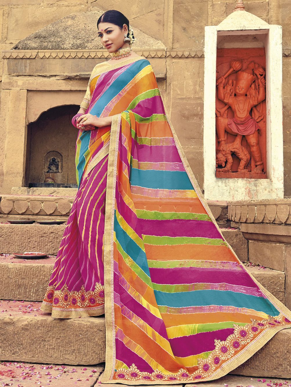 The Leheriya sarees are tied in a way that, after being dyed, creates a kaleidoscopic wavy pattern.(pinterest)