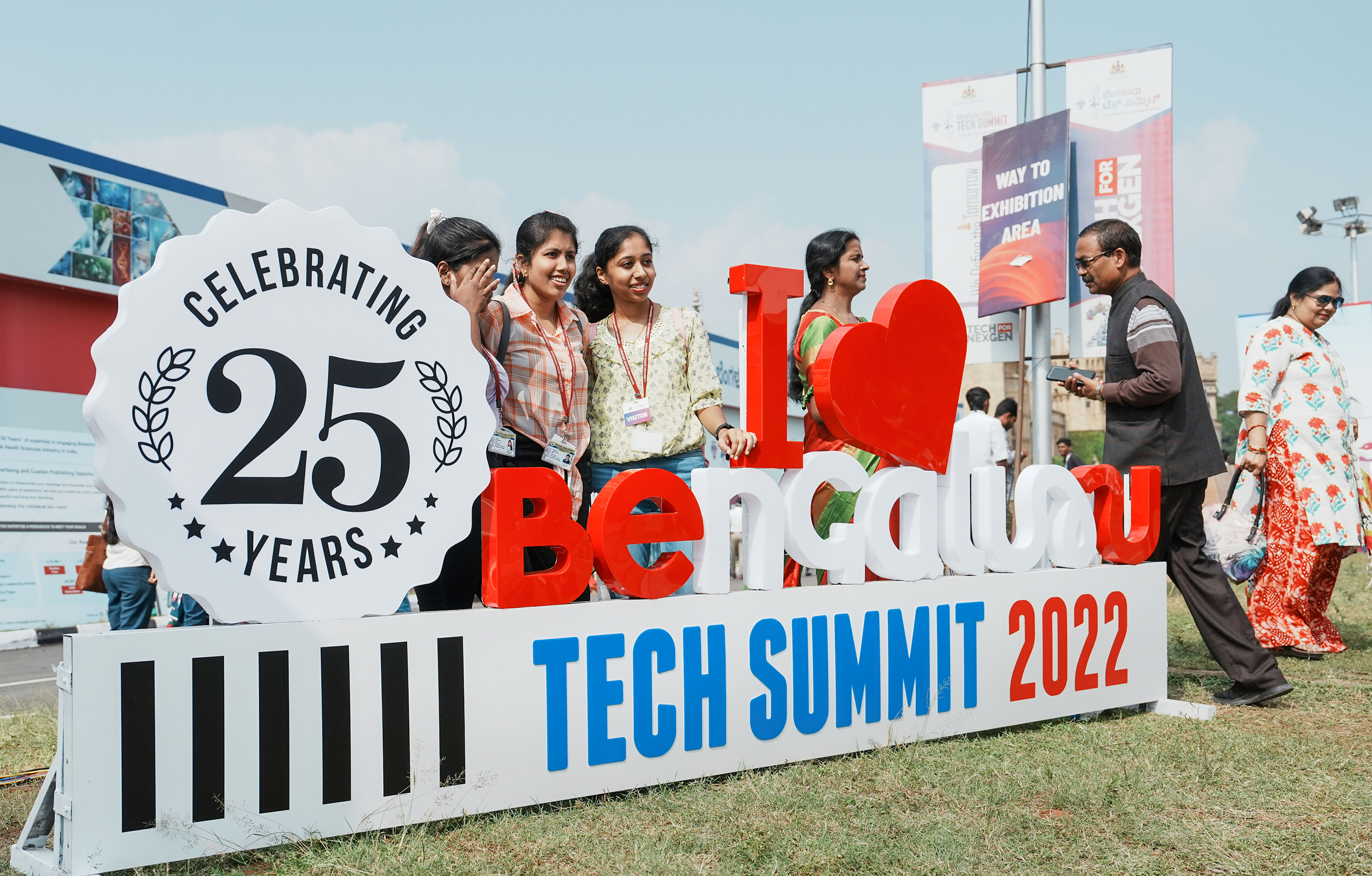 Bengaluru: Visitors pose for photographs during the inauguration of the Bengaluru Tech Summit 2022, at Palace Ground in Bengaluru. (PTI Photo/Shailendra Bhojak) (PTI) Bengaluru: Visitors pose for photographs during the inauguration of the Bengaluru Tech Summit 2022, at Palace Ground in Bengaluru. (PTI Photo/Shailendra Bhojak) (PTI)