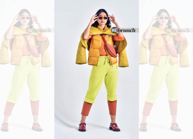 The inner silhouette can be form-fitting, but the layer on top is flattering when it’s fuss-free;Sweater, trousers (outer) & jacket (outer) by United Colors of Benetton; Jacket (inner) pants & fanny pack by Uniqlo; Shoes by Theatre; Sunglasses by Burberry (Raj K Raj)