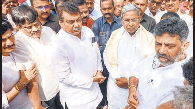 Congress leaders Siddaramaiah, DK Shivakumar and others arrive at the Karnataka Election Commission office to file a complaint against the alleged electoral fraud, in Bengaluru on Saturday. (PTI) Congress leaders Siddaramaiah, DK Shivakumar and others arrive at the Karnataka Election Commission office to file a complaint against the alleged electoral fraud, in Bengaluru on Saturday. (PTI)