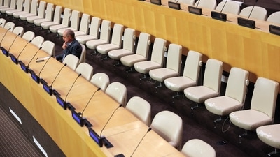 An attendee awaits the commencement of a UN Security Council Arria-formula meeting. (Reuters)