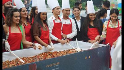 Hotels across Delhi-NCR celebrate the age-old tradition of cake mixing on a large scale after two and a half years of Covid-19. Hotels across Delhi-NCR celebrate the age-old tradition of cake mixing on a large scale after two and a half years of Covid-19.