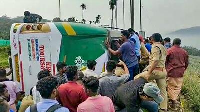 Rescue operation underway after a bus carrying Sabarimala pilgrims from Andhra Pradesh met with an accident and overturned, near Laha in Pathanamthitta district on Saturday. (PTI) Rescue operation underway after a bus carrying Sabarimala pilgrims from Andhra Pradesh met with an accident and overturned, near Laha in Pathanamthitta district on Saturday. (PTI)