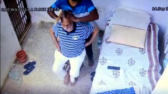 A CCTV video shows jailed Delhi Minister and Aam Aadmi Party (AAP) leader Satyendar Jain getting a head massage inside Tihar Jail, in New Delhi on Saturday. (ANI)