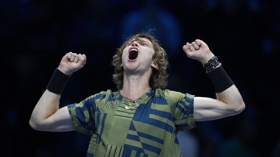 Russia's Andrey Rublev celebrates after winning against Greece's Stefanos Tsitsipas during their singles tennis match of the ATP World Tour Finals(AP)