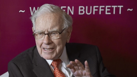 Warren Buffett, Chairman and CEO of Berkshire Hathaway, speaks during a game of bridge following the annual Berkshire Hathaway shareholders meeting.(AP file)