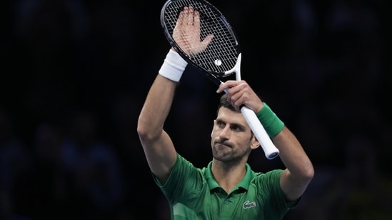 Serbia's Novak Djokovic celebrates after winning against United States' Taylor Fritz during their singles semifinal tennis match of the ATP World Tour Finals, at the Pala Alpitour in Turin, Italy, Saturday, Nov. 19, 2022. (AP)