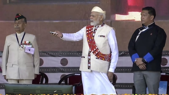 Prime Minister Narendra Modi - during the inauguration of Donyi Polo Airport - is seen with Arunachal Pradesh chief minister Pema Khandu (R)(PTI)