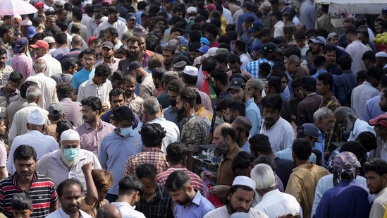 Pakistanis shops in a weekly pet market in Lahore, Pakistan.(AP)