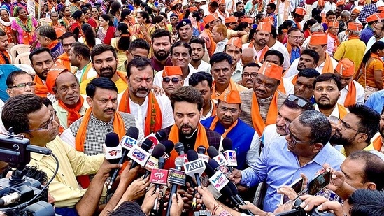 Minister of Information and Broadcasting Anurag Thakur speaks to the media regarding Congress leader Rahul Gandhi's remarks on Veer Savarkar during a public meeting for the upcoming Gujarat Assembly elections, at Mangrol, in Junagadh on Friday.(Twitter)