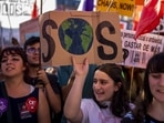 People gather for a global climate strike in Madrid, Spain.(AP File Photo/Representative) People gather for a global climate strike in Madrid, Spain.(AP File Photo/Representative)