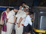 Police investigate the crime spot after an explosion in an auto-rickshaw, in Mangaluru. (PTI Photo) Police investigate the crime spot after an explosion in an auto-rickshaw, in Mangaluru. (PTI Photo)