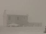 A clip tweeted by Buffalo Weather news captures an aerial view with houses entirely wrapped in snow.