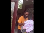 Man getting ecstatic upon meeting her sister's newborn for the first time. Man getting ecstatic upon meeting her sister's newborn for the first time.