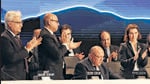 Delegates applaud after COP27 president Sameh Shoukry delivers a statement during the closing plenary at the COP27 climate summit in Egypt on Sunday (REUTERS)