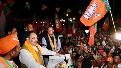 BJP chief J P Nadda during a road show in Sangam Vihar ahead of the MCD elections, in New Delhi, India on November 20. (HT Photo) BJP chief J P Nadda during a road show in Sangam Vihar ahead of the MCD elections, in New Delhi, India on November 20. (HT Photo)