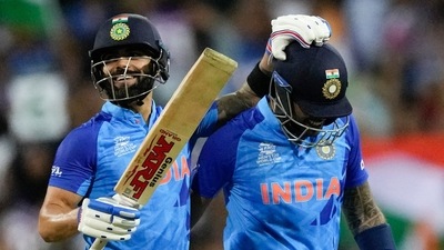 India's Virat Kohli, left, and teammate Suryakumar Yadav react at the end of their innings (AP)