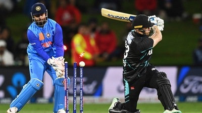 Glenn Phillips is bowled during the T20I between India and New Zealand at Bay Oval (AP) Glenn Phillips is bowled during the T20I between India and New Zealand at Bay Oval (AP)