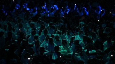 Fans during the opening ceremony. (REUTERS)